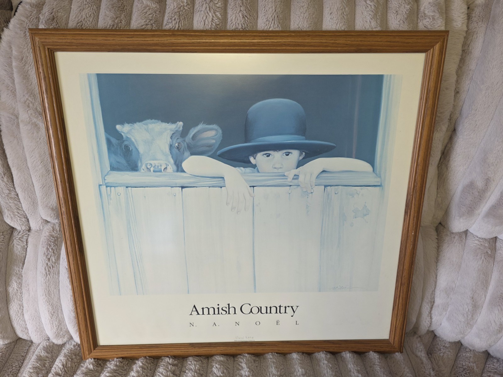 24″ x 25″ – N. A. Noel – Amish Country – “Mein Kalb” – Blue Toned Framed Art
